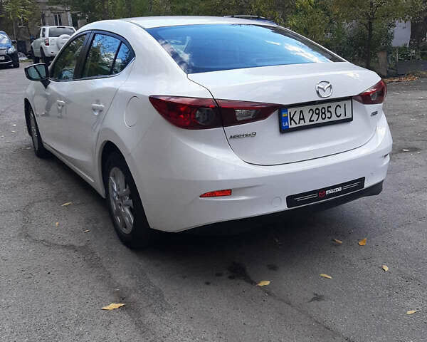 Белый Мазда 3, объемом двигателя 2 л и пробегом 211 тыс. км за 9300 $, фото 4 на Automoto.ua