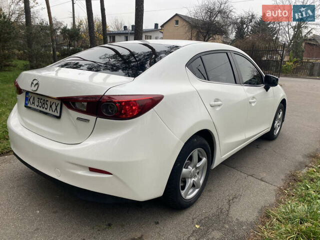 Білий Мазда 3, об'ємом двигуна 2 л та пробігом 175 тис. км за 9000 $, фото 35 на Automoto.ua