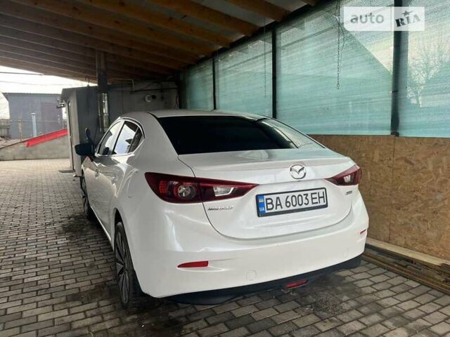 Білий Мазда 3, об'ємом двигуна 1.5 л та пробігом 159 тис. км за 10000 $, фото 7 на Automoto.ua