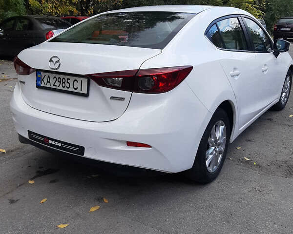 Белый Мазда 3, объемом двигателя 2 л и пробегом 211 тыс. км за 9300 $, фото 3 на Automoto.ua