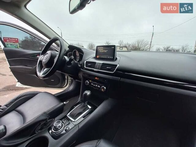Білий Мазда 3, об'ємом двигуна 2 л та пробігом 147 тис. км за 11500 $, фото 16 на Automoto.ua