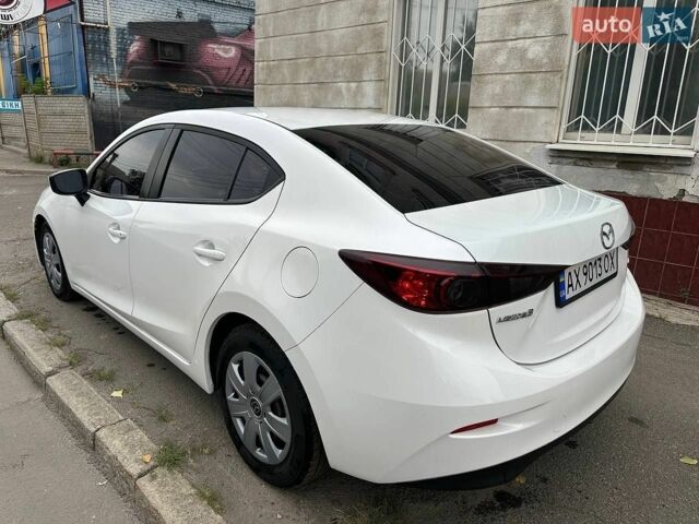 Белый Мазда 3, объемом двигателя 2 л и пробегом 111 тыс. км за 12500 $, фото 1 на Automoto.ua