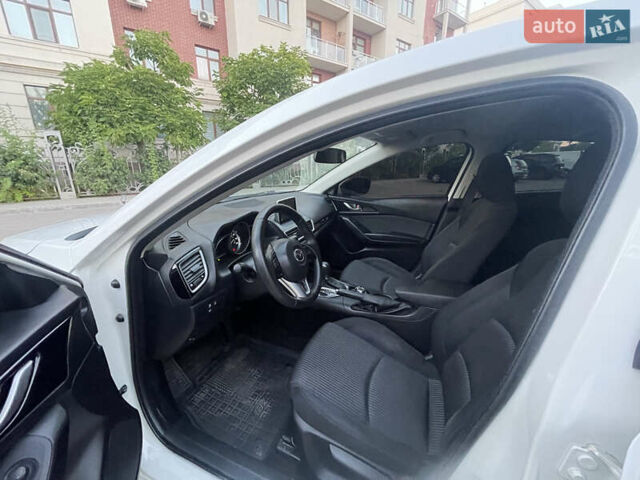 Белый Мазда 3, объемом двигателя 2 л и пробегом 200 тыс. км за 10500 $, фото 12 на Automoto.ua