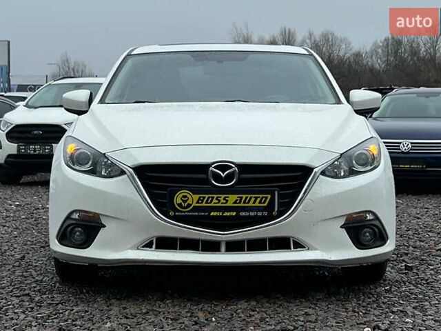 Белый Мазда 3, объемом двигателя 2 л и пробегом 119 тыс. км за 12650 $, фото 1 на Automoto.ua