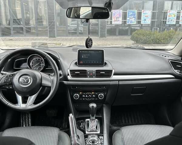 Белый Мазда 3, объемом двигателя 1.5 л и пробегом 128 тыс. км за 13500 $, фото 12 на Automoto.ua