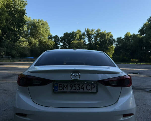 Белый Мазда 3, объемом двигателя 2 л и пробегом 129 тыс. км за 11000 $, фото 4 на Automoto.ua