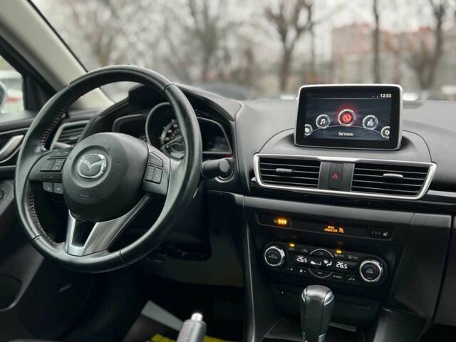 Белый Мазда 3, объемом двигателя 2 л и пробегом 119 тыс. км за 12650 $, фото 18 на Automoto.ua