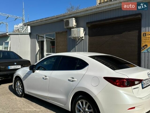 Белый Мазда 3, объемом двигателя 2 л и пробегом 111 тыс. км за 10700 $, фото 12 на Automoto.ua