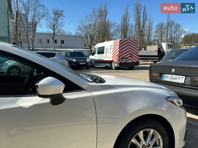 Белый Мазда 3, объемом двигателя 2 л и пробегом 111 тыс. км за 10700 $, фото 7 на Automoto.ua