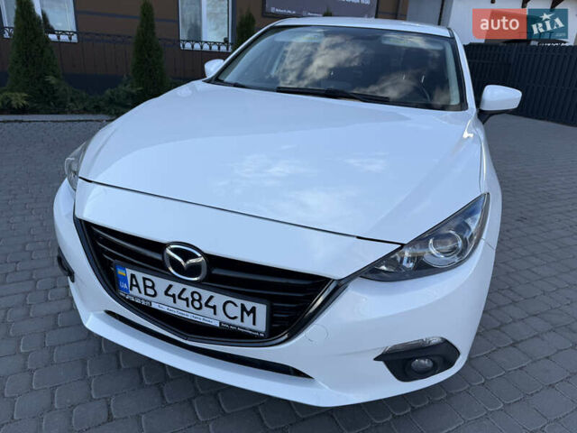 Белый Мазда 3, объемом двигателя 2 л и пробегом 114 тыс. км за 10900 $, фото 4 на Automoto.ua
