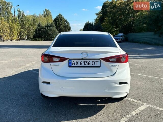 Білий Мазда 3, об'ємом двигуна 2 л та пробігом 206 тис. км за 8700 $, фото 2 на Automoto.ua