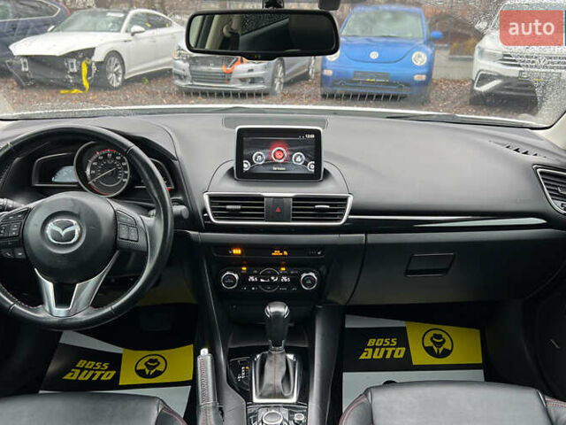 Белый Мазда 3, объемом двигателя 2 л и пробегом 119 тыс. км за 12650 $, фото 10 на Automoto.ua