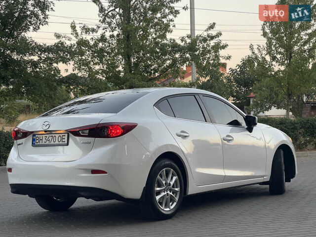 Белый Мазда 3, объемом двигателя 2 л и пробегом 200 тыс. км за 10500 $, фото 10 на Automoto.ua