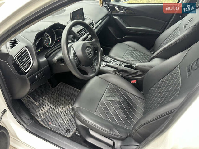 Белый Мазда 3, объемом двигателя 2 л и пробегом 173 тыс. км за 8700 $, фото 21 на Automoto.ua