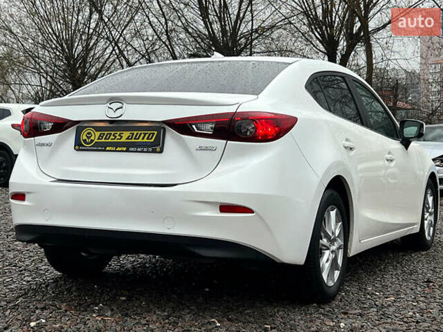 Белый Мазда 3, объемом двигателя 2 л и пробегом 119 тыс. км за 12650 $, фото 5 на Automoto.ua