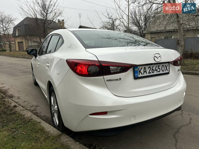 Белый Мазда 3, объемом двигателя 2 л и пробегом 173 тыс. км за 8700 $, фото 10 на Automoto.ua