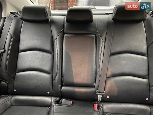 Білий Мазда 3, об'ємом двигуна 2 л та пробігом 166 тис. км за 12900 $, фото 11 на Automoto.ua