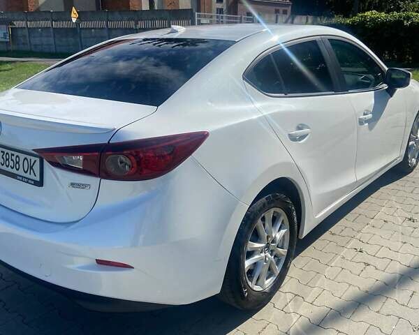 Белый Мазда 3, объемом двигателя 2 л и пробегом 166 тыс. км за 12500 $, фото 4 на Automoto.ua