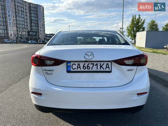 Білий Мазда 3, об'ємом двигуна 2 л та пробігом 156 тис. км за 10799 $, фото 5 на Automoto.ua
