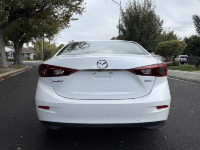 Білий Мазда 3, об'ємом двигуна 2 л та пробігом 70 тис. км за 8700 $, фото 5 на Automoto.ua
