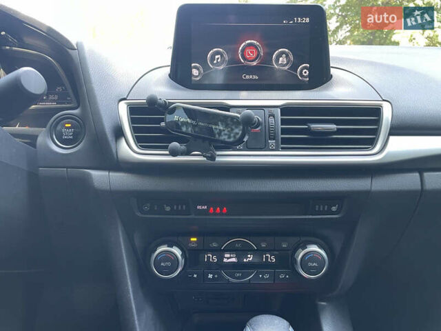 Білий Мазда 3, об'ємом двигуна 1.6 л та пробігом 116 тис. км за 13000 $, фото 11 на Automoto.ua