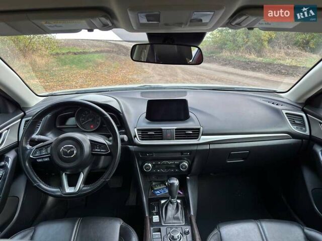 Белый Мазда 3, объемом двигателя 2 л и пробегом 143 тыс. км за 12900 $, фото 8 на Automoto.ua