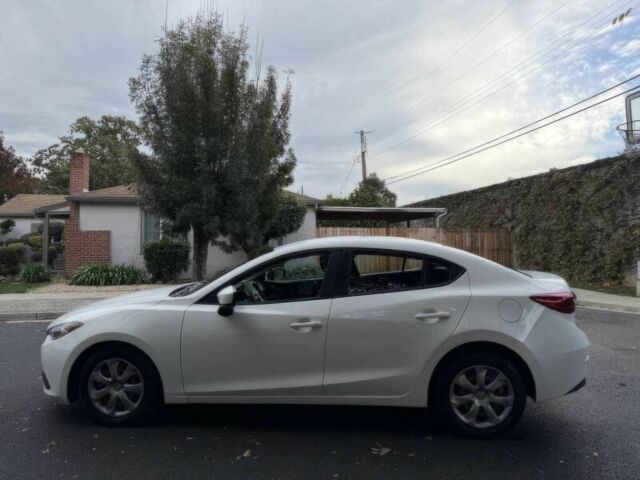 Білий Мазда 3, об'ємом двигуна 2 л та пробігом 70 тис. км за 8700 $, фото 2 на Automoto.ua