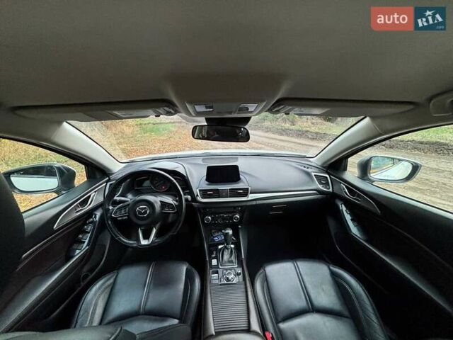 Белый Мазда 3, объемом двигателя 2 л и пробегом 143 тыс. км за 12900 $, фото 7 на Automoto.ua