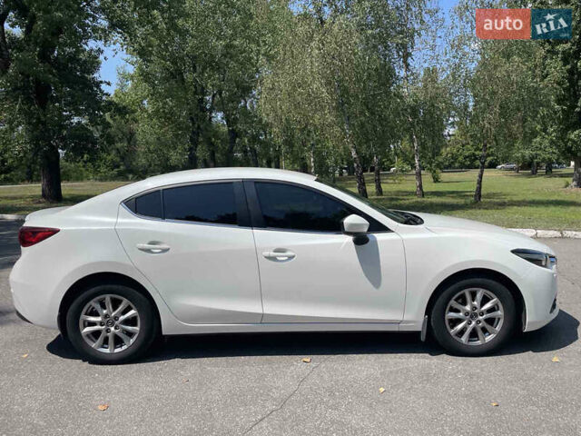 Білий Мазда 3, об'ємом двигуна 1.6 л та пробігом 116 тис. км за 13000 $, фото 4 на Automoto.ua