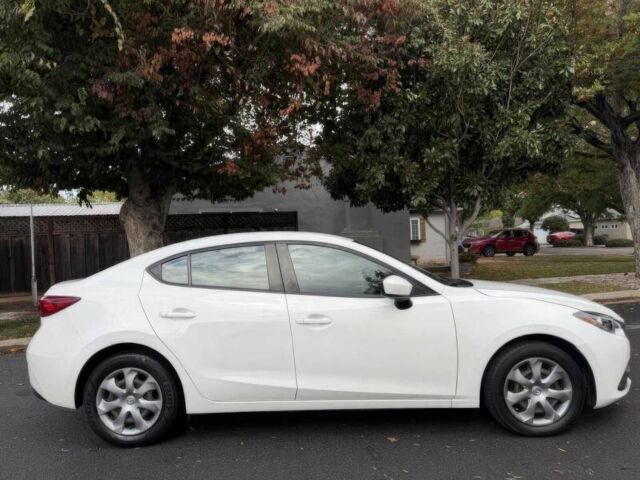 Білий Мазда 3, об'ємом двигуна 2 л та пробігом 70 тис. км за 8700 $, фото 3 на Automoto.ua