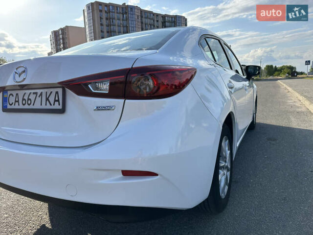 Білий Мазда 3, об'ємом двигуна 2 л та пробігом 156 тис. км за 10799 $, фото 12 на Automoto.ua