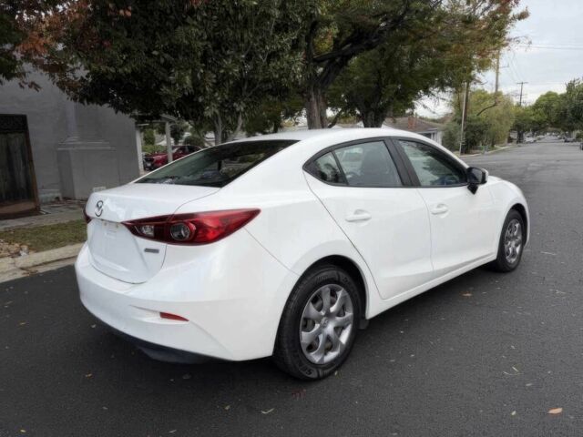 Білий Мазда 3, об'ємом двигуна 2 л та пробігом 70 тис. км за 8700 $, фото 4 на Automoto.ua