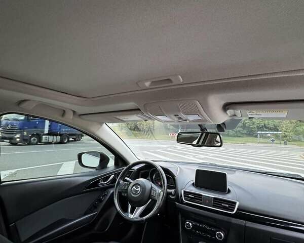 Білий Мазда 3, об'ємом двигуна 2 л та пробігом 178 тис. км за 12900 $, фото 13 на Automoto.ua
