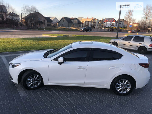 Белый Мазда 3, объемом двигателя 2 л и пробегом 118 тыс. км за 11000 $, фото 15 на Automoto.ua