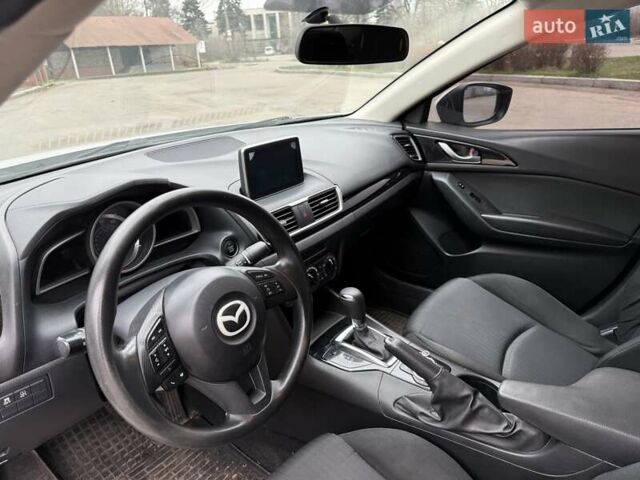 Белый Мазда 3, объемом двигателя 2 л и пробегом 142 тыс. км за 9000 $, фото 9 на Automoto.ua