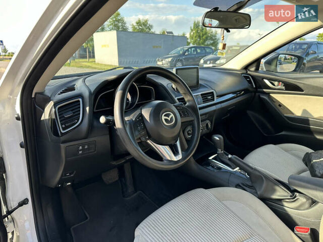 Білий Мазда 3, об'ємом двигуна 2 л та пробігом 156 тис. км за 10799 $, фото 15 на Automoto.ua
