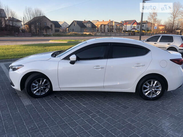 Белый Мазда 3, объемом двигателя 2 л и пробегом 118 тыс. км за 11000 $, фото 19 на Automoto.ua
