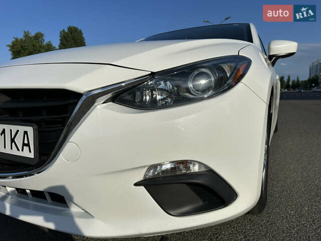Білий Мазда 3, об'ємом двигуна 2 л та пробігом 156 тис. км за 10799 $, фото 9 на Automoto.ua