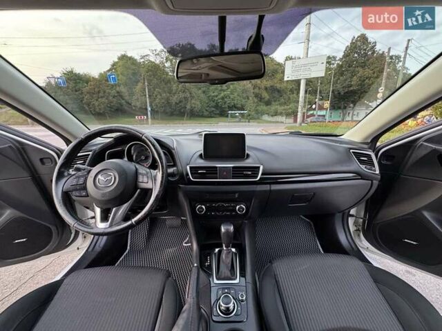 Білий Мазда 3, об'ємом двигуна 2 л та пробігом 178 тис. км за 12900 $, фото 16 на Automoto.ua