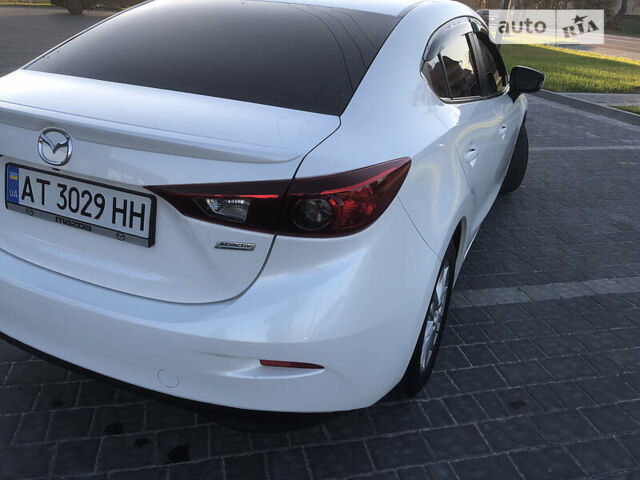 Белый Мазда 3, объемом двигателя 2 л и пробегом 118 тыс. км за 11000 $, фото 18 на Automoto.ua