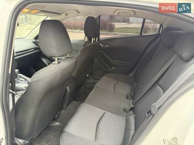 Белый Мазда 3, объемом двигателя 2 л и пробегом 142 тыс. км за 9000 $, фото 12 на Automoto.ua