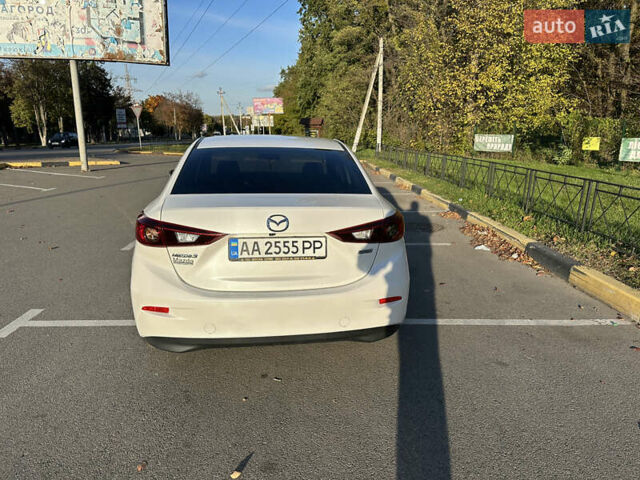 Білий Мазда 3, об'ємом двигуна 2 л та пробігом 52 тис. км за 12000 $, фото 9 на Automoto.ua
