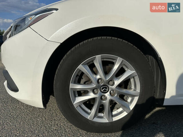 Білий Мазда 3, об'ємом двигуна 2 л та пробігом 156 тис. км за 10799 $, фото 8 на Automoto.ua