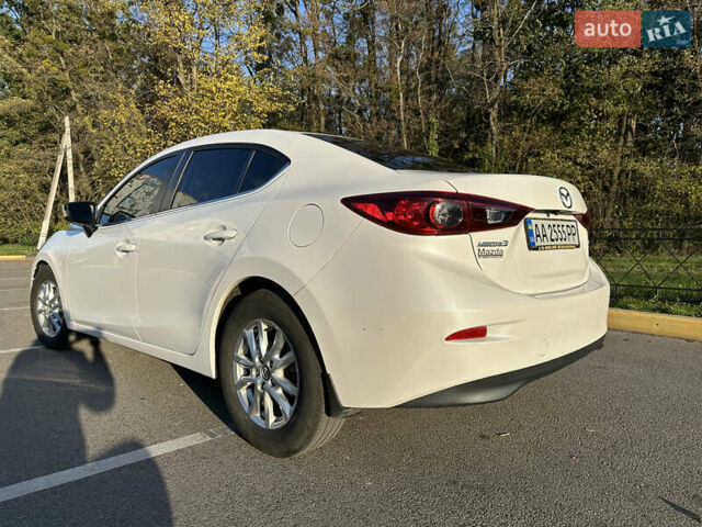 Білий Мазда 3, об'ємом двигуна 2 л та пробігом 52 тис. км за 12000 $, фото 11 на Automoto.ua