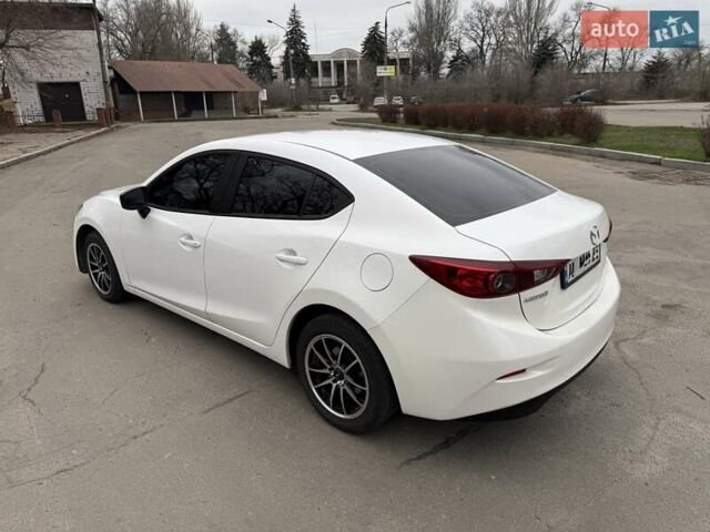 Белый Мазда 3, объемом двигателя 2 л и пробегом 142 тыс. км за 9000 $, фото 5 на Automoto.ua