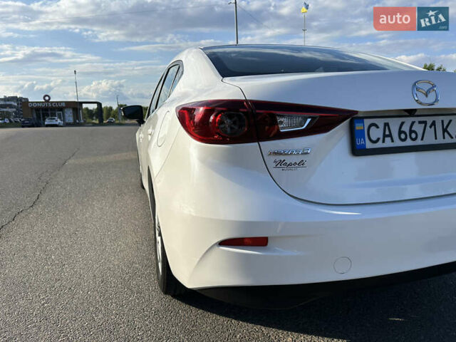 Білий Мазда 3, об'ємом двигуна 2 л та пробігом 156 тис. км за 10799 $, фото 11 на Automoto.ua