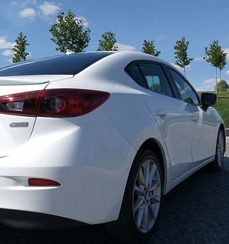 Белый Мазда 3, объемом двигателя 2 л и пробегом 126 тыс. км за 14500 $, фото 1 на Automoto.ua