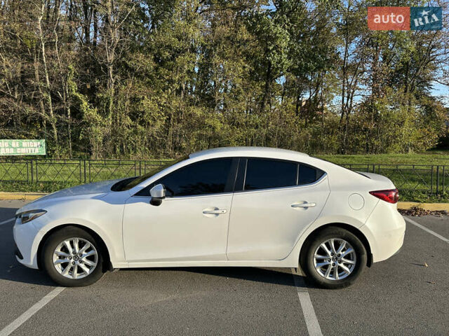 Білий Мазда 3, об'ємом двигуна 2 л та пробігом 52 тис. км за 12000 $, фото 1 на Automoto.ua