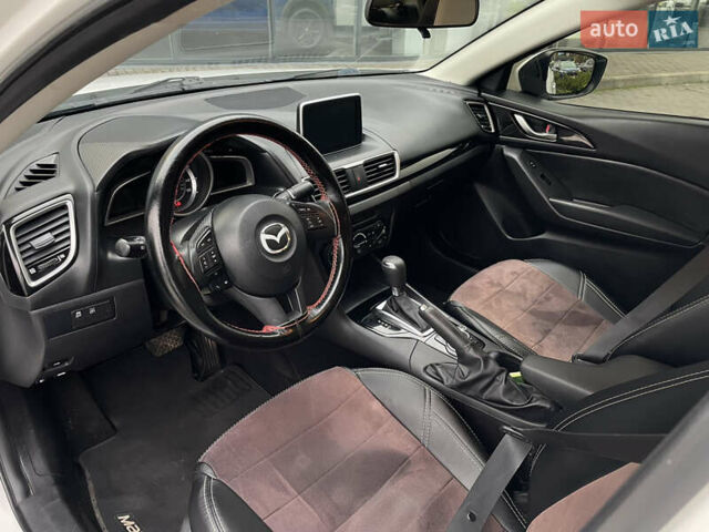 Белый Мазда 3, объемом двигателя 2 л и пробегом 168 тыс. км за 11100 $, фото 22 на Automoto.ua