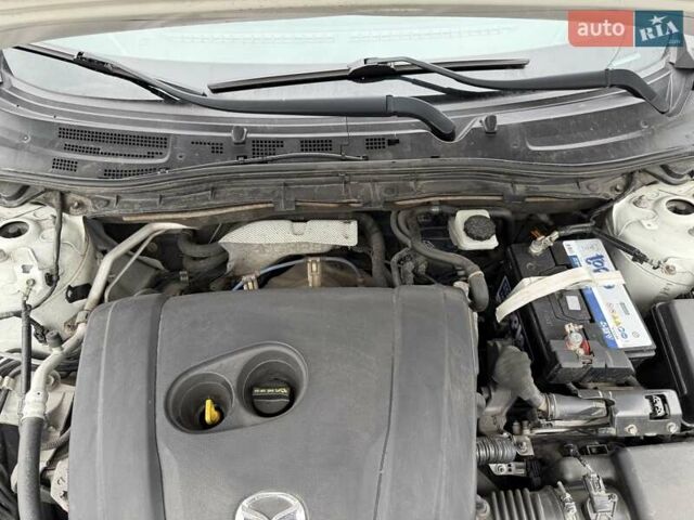 Белый Мазда 3, объемом двигателя 2 л и пробегом 142 тыс. км за 9000 $, фото 20 на Automoto.ua